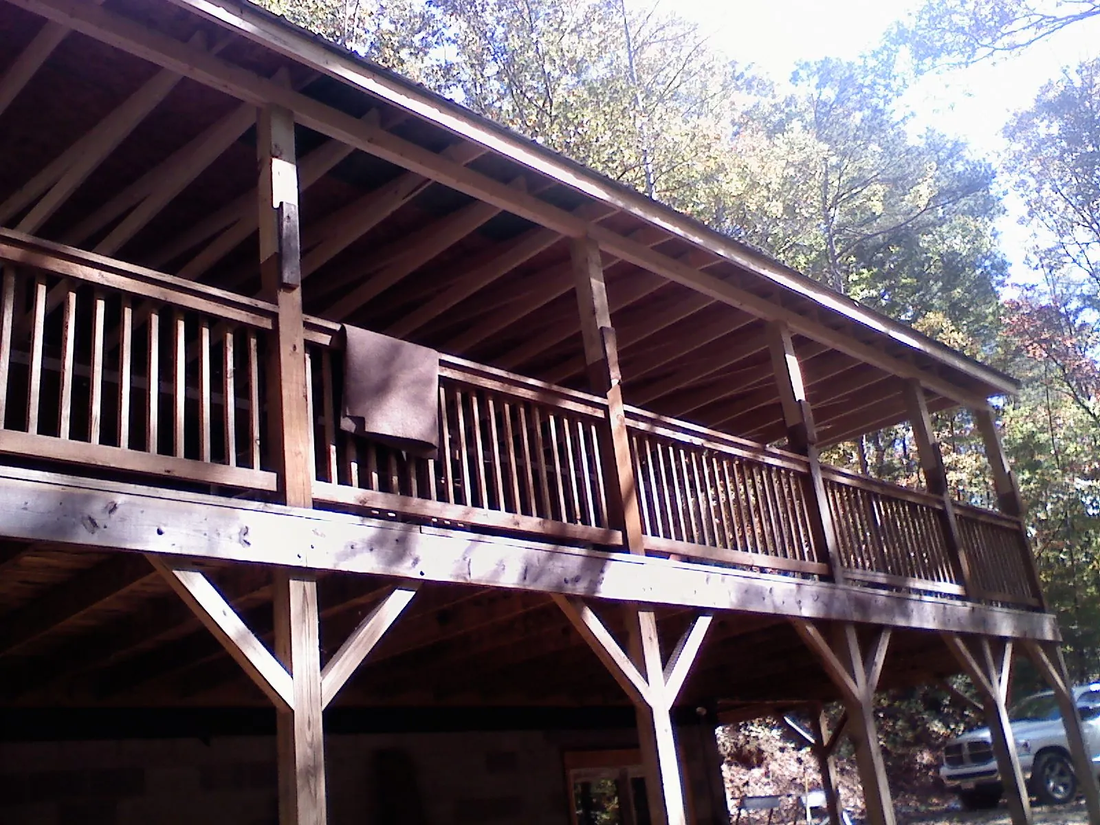 Timber framing under a new elevated porch and deck — Roof Leak Repair in Bear Lake by Roofing Brothers